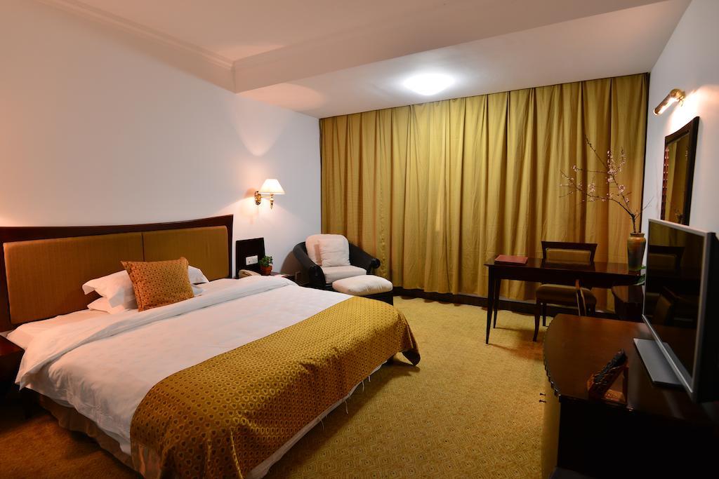Baodao Exhibition Center Hotel Wuyishan  Rom bilde