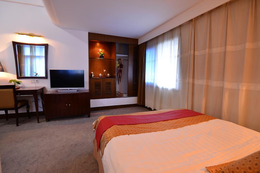 Baodao Exhibition Center Hotel Wuyishan  Rom bilde